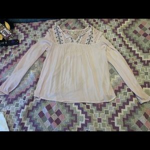 Long sleeved light purple blouse